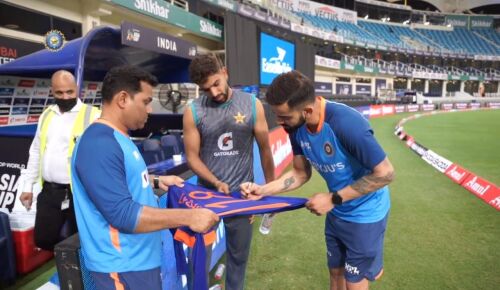 Kohli gifts autographed jersey to Pakistan's Haris Rauf; video goes viral Image